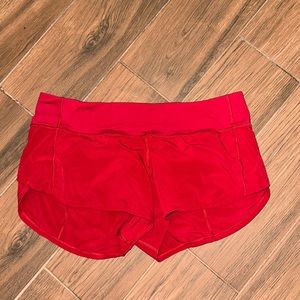 Size 8 lululemon speed up short 2.5 inch inseam. Good as new!